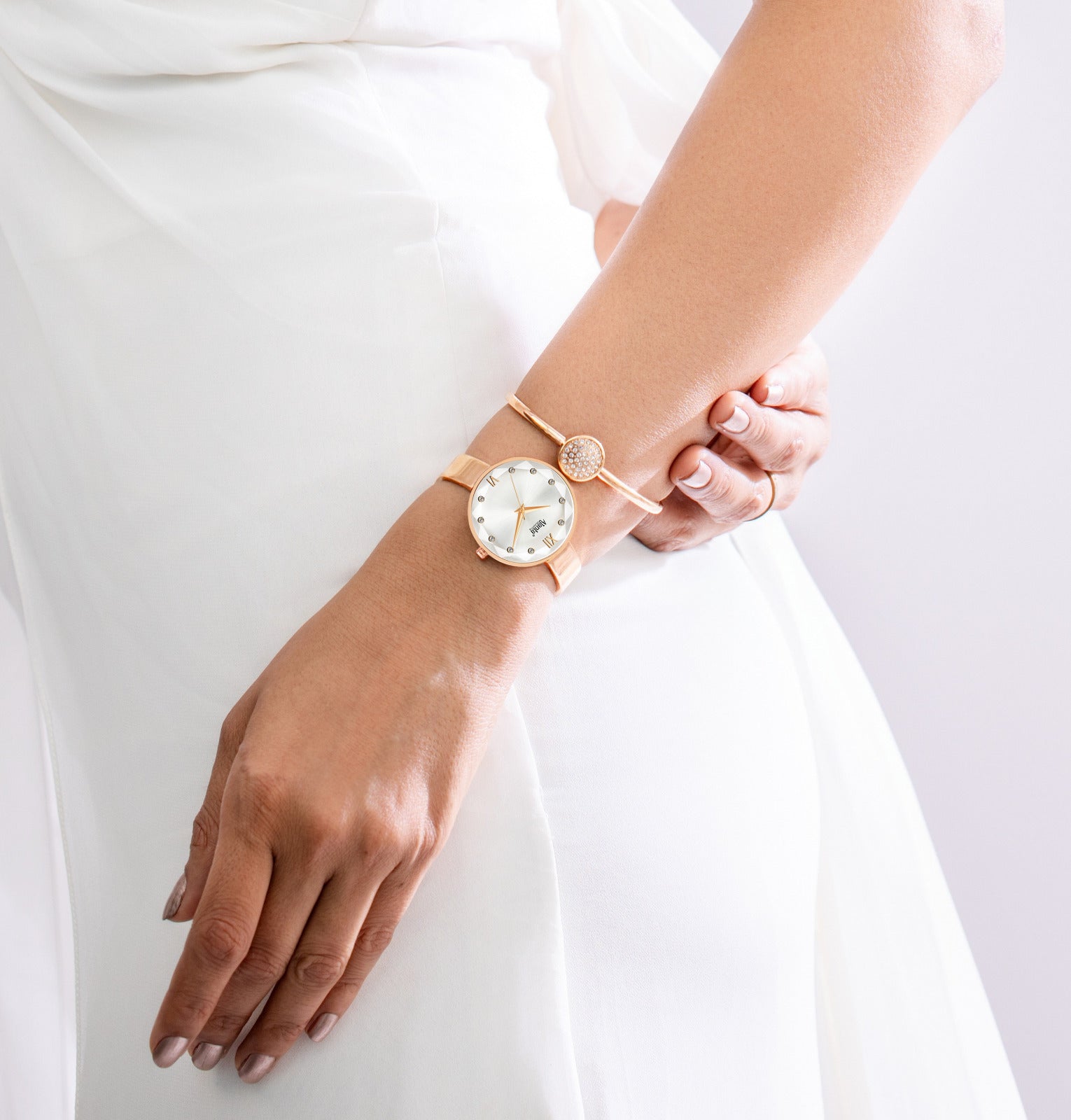 Ajanta Quartz Rose Gold Women's Watch with Silver Dial & Matching Bracelet  — Crystal Studded Analog Wrist Watch| AWC126ESL/2